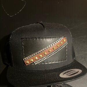 Stylish Black Cap with Gold and Silver Accents